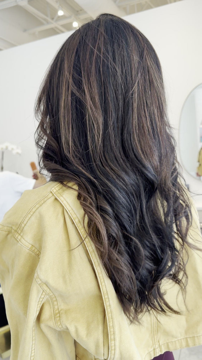 Long brunette waves with soft highlights, finished at LAHH Salon