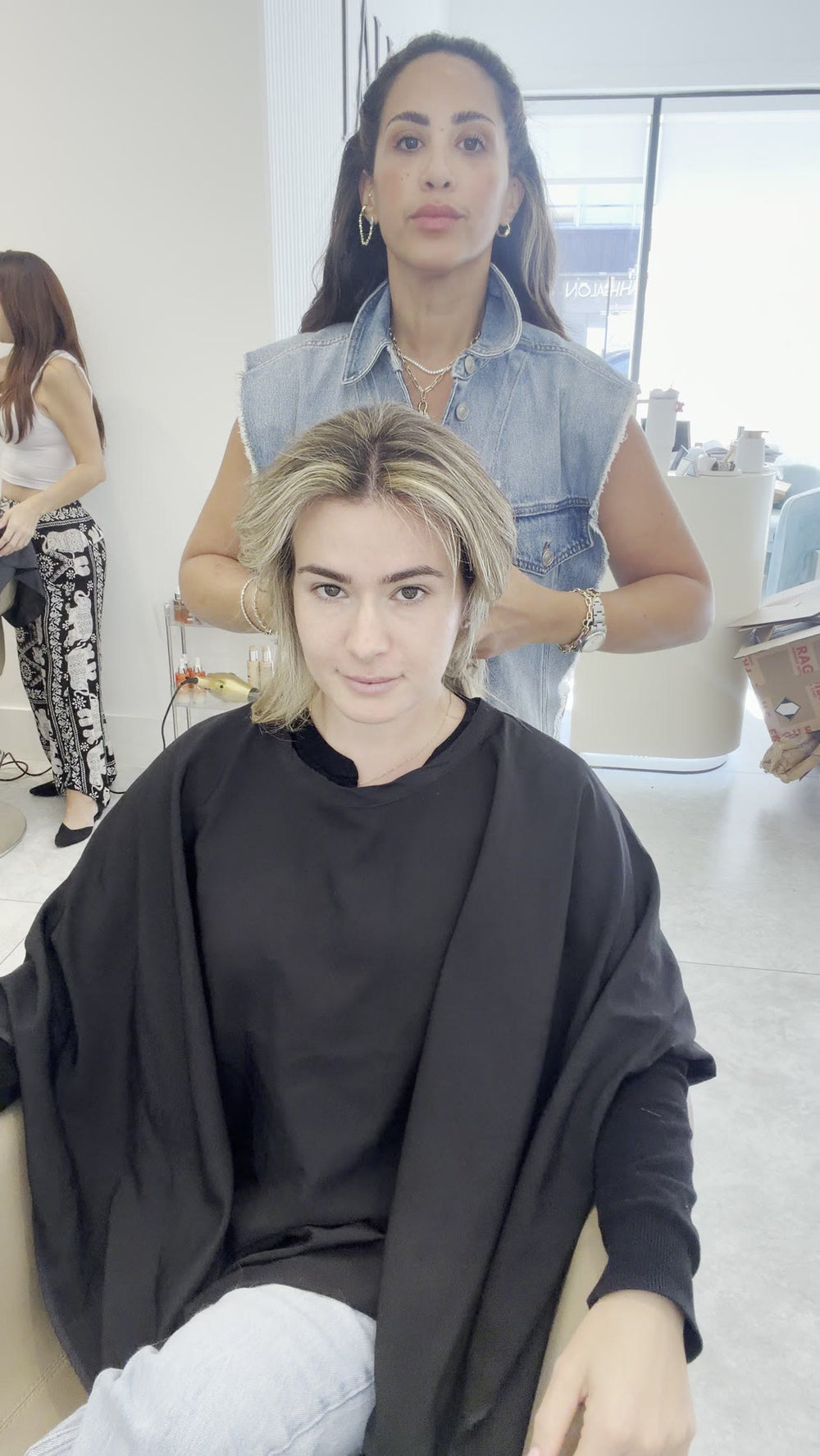 Before: chin-length blonde hair at a LAHH Salon station